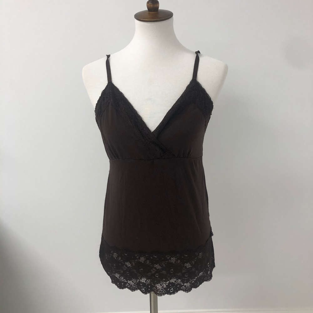 A brown soft tank top with lace around the edges